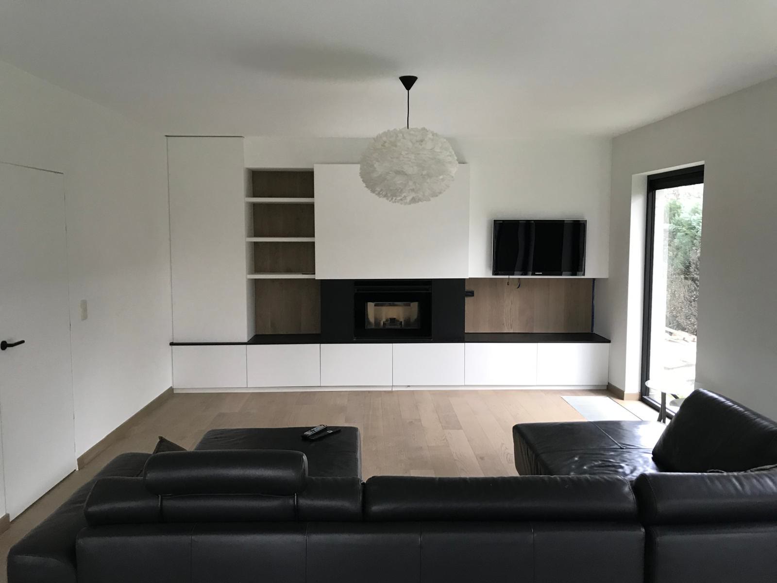 Living room we repainted in white, two coats